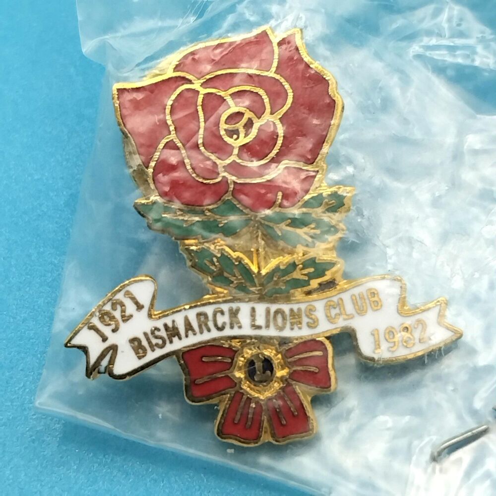 Bismarck Lions Club Vintage Pin in Original Plastic Rose 1982 Gold Tone Enamel